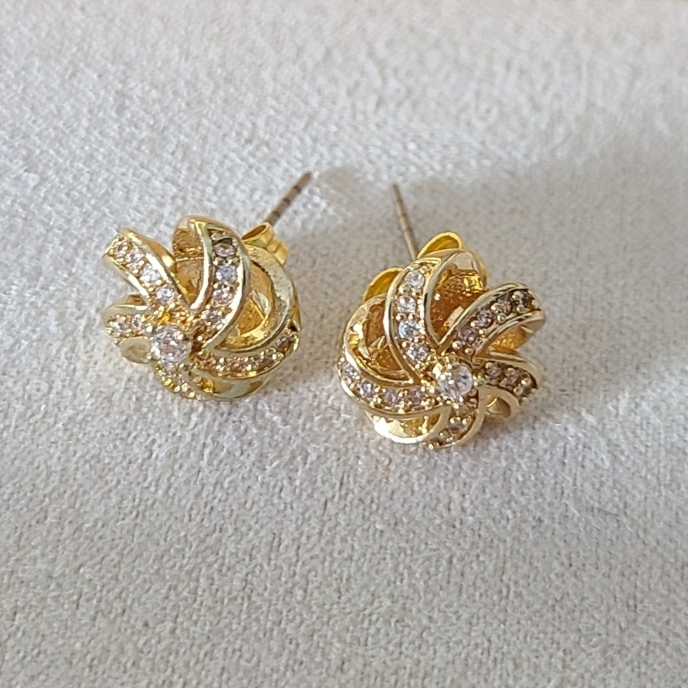Gold Tone Swil Stud Earrings